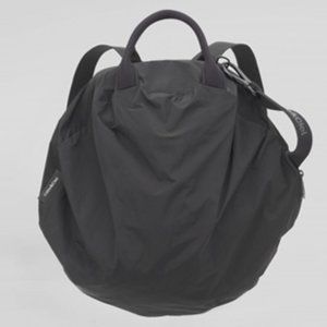 Cote&Ciel Moselle laptop backpack tote in black memory tech fabric